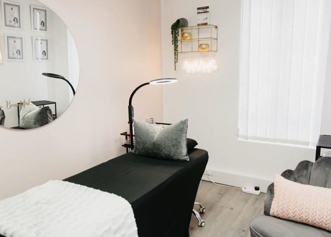 Relaxing treatment room at The Brow Specialist, Somerset West, Western Cape, ZA, showcasing elegant decor.