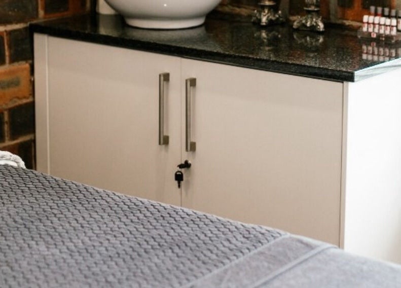 Relaxing treatment area at The Brow Specialist in Somerset West, Western Cape, ZA with cozy decor.