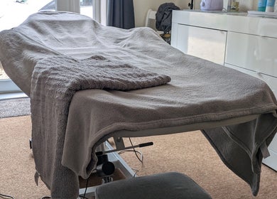 Relaxing treatment room at Beauty by Bex in March, England, GB featuring a comfortable spa bed.