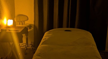 Cozy Beauty by Bex Treatment Room with warm lighting in March, England, GB.