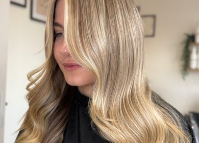 Blonde hair waved perfectly at Millie @ Shade Harrogate, an elegant salon in Harrogate, England, GB.