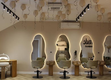 Elegant salon interior at Millie @ Shade Harrogate, featuring modern decor and ambient lighting in Harrogate, England, GB.