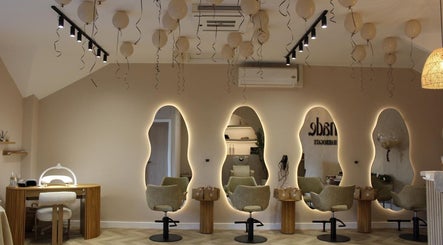 Elegant salon interior at Millie @ Shade Harrogate, featuring modern decor and ambient lighting in Harrogate, England, GB.