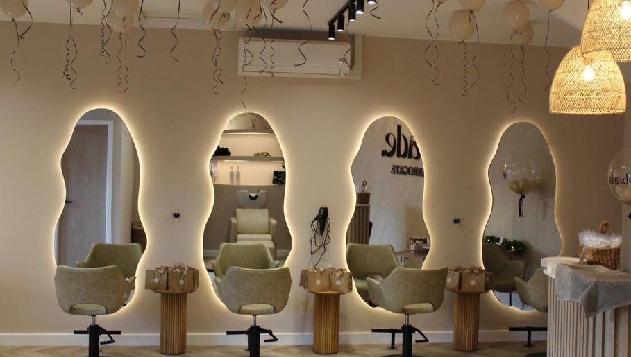 Elegant salon mirrors at Millie at Shade Harrogate, Harrogate, England, GB showcasing modern design.