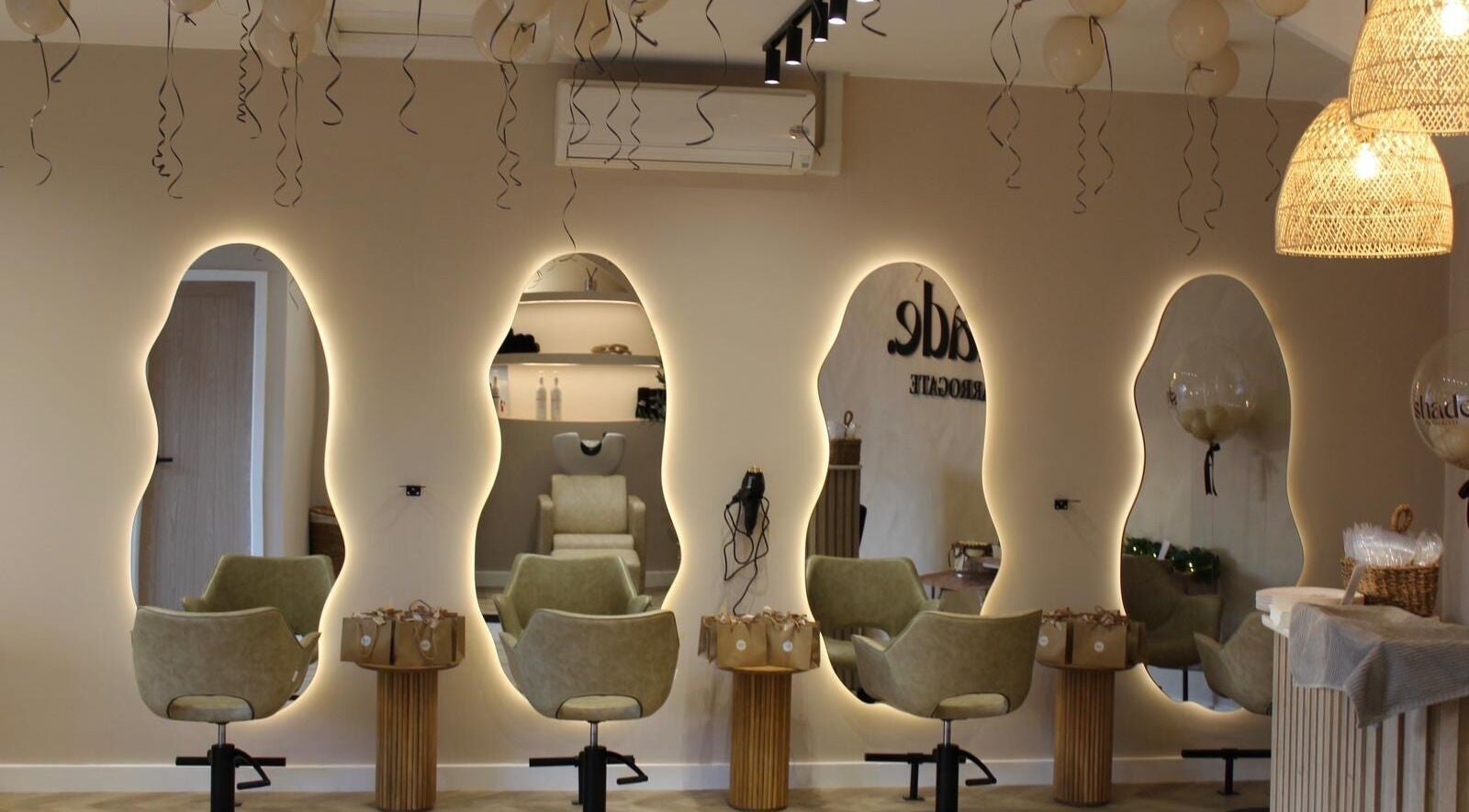 Elegant salon mirrors at Millie at Shade Harrogate, Harrogate, England, GB showcasing modern design.