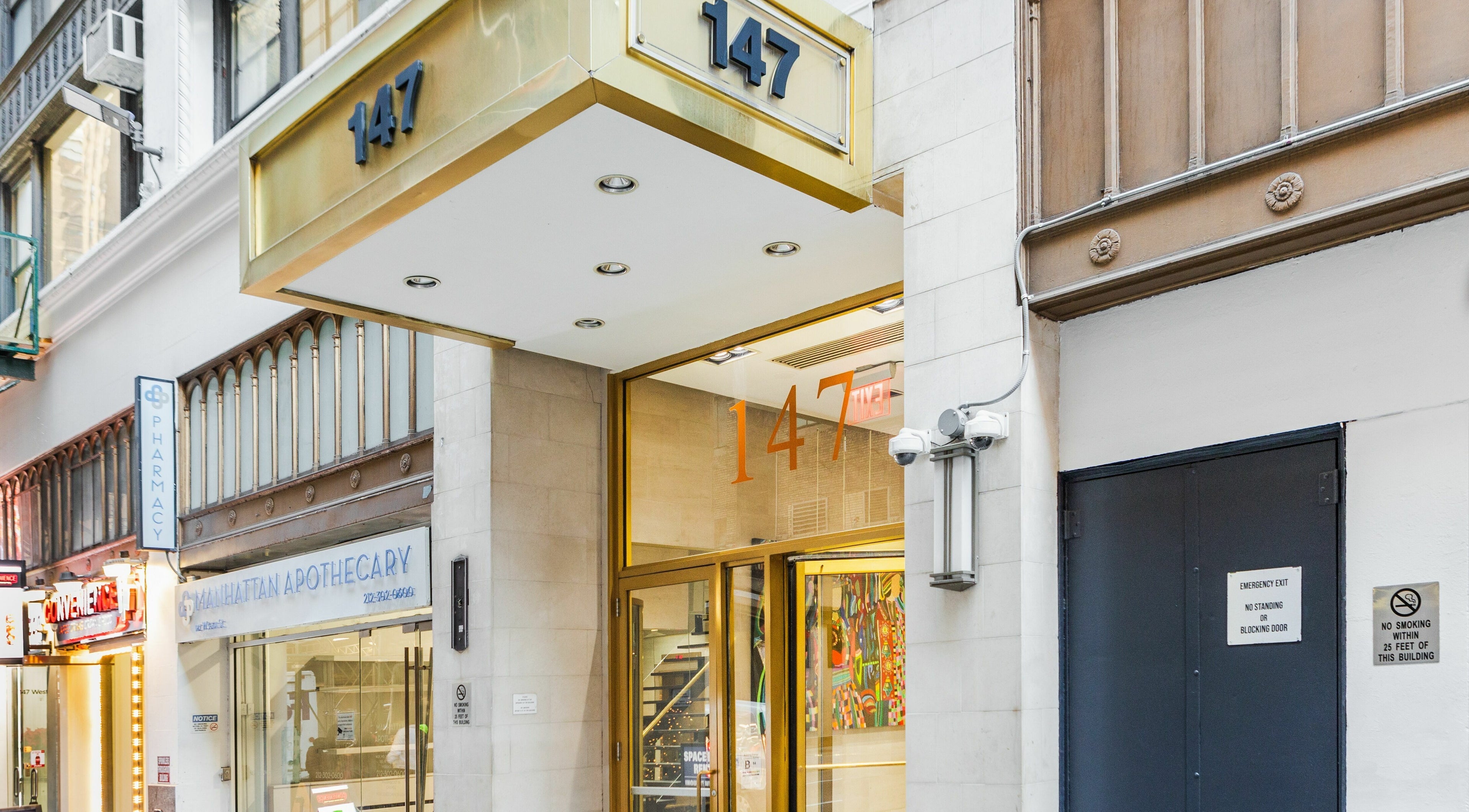 Entrance of V Lash Studio in New York, New York, US, with number 147 prominently displayed.