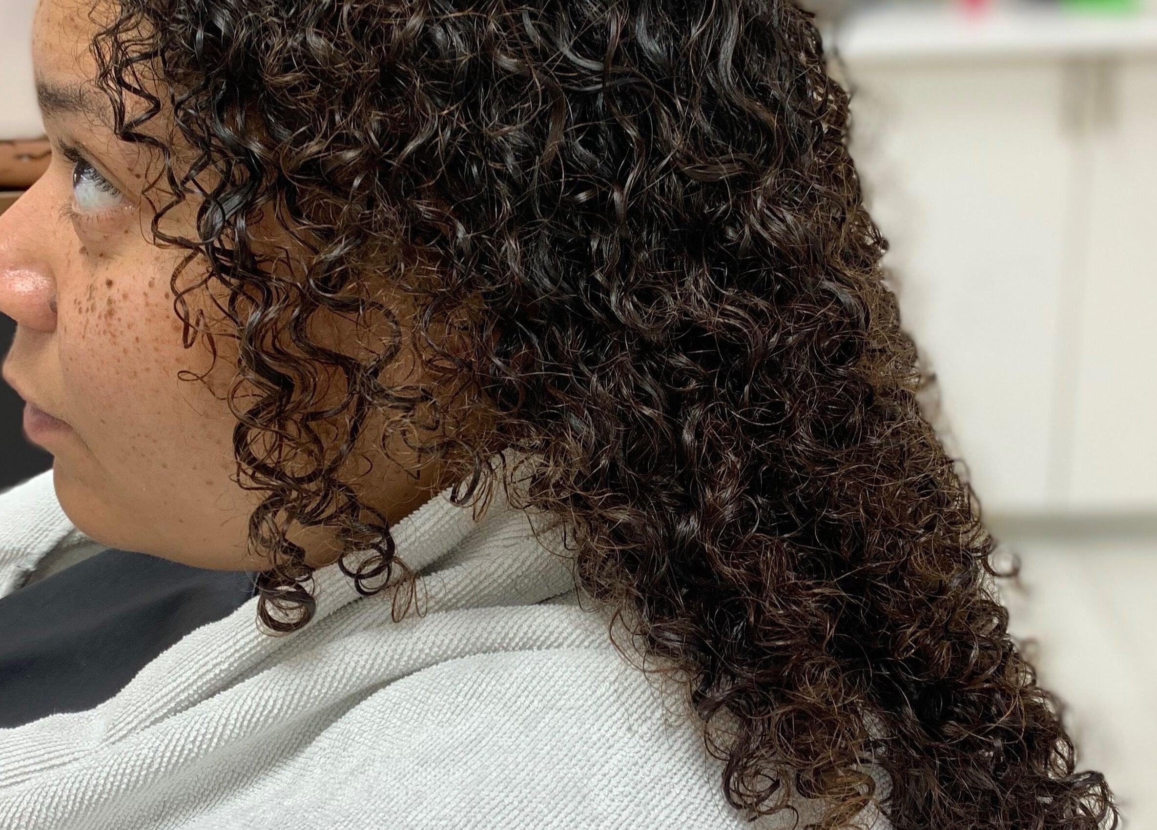 Close-up of styled curly hair at Manes by Morgan, Willenhall, England, GB.