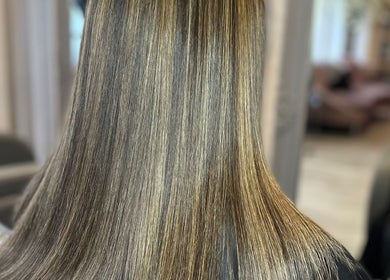 Smooth, shiny hair styled at Manes by Morgan, Birmingham, England, GB salon.