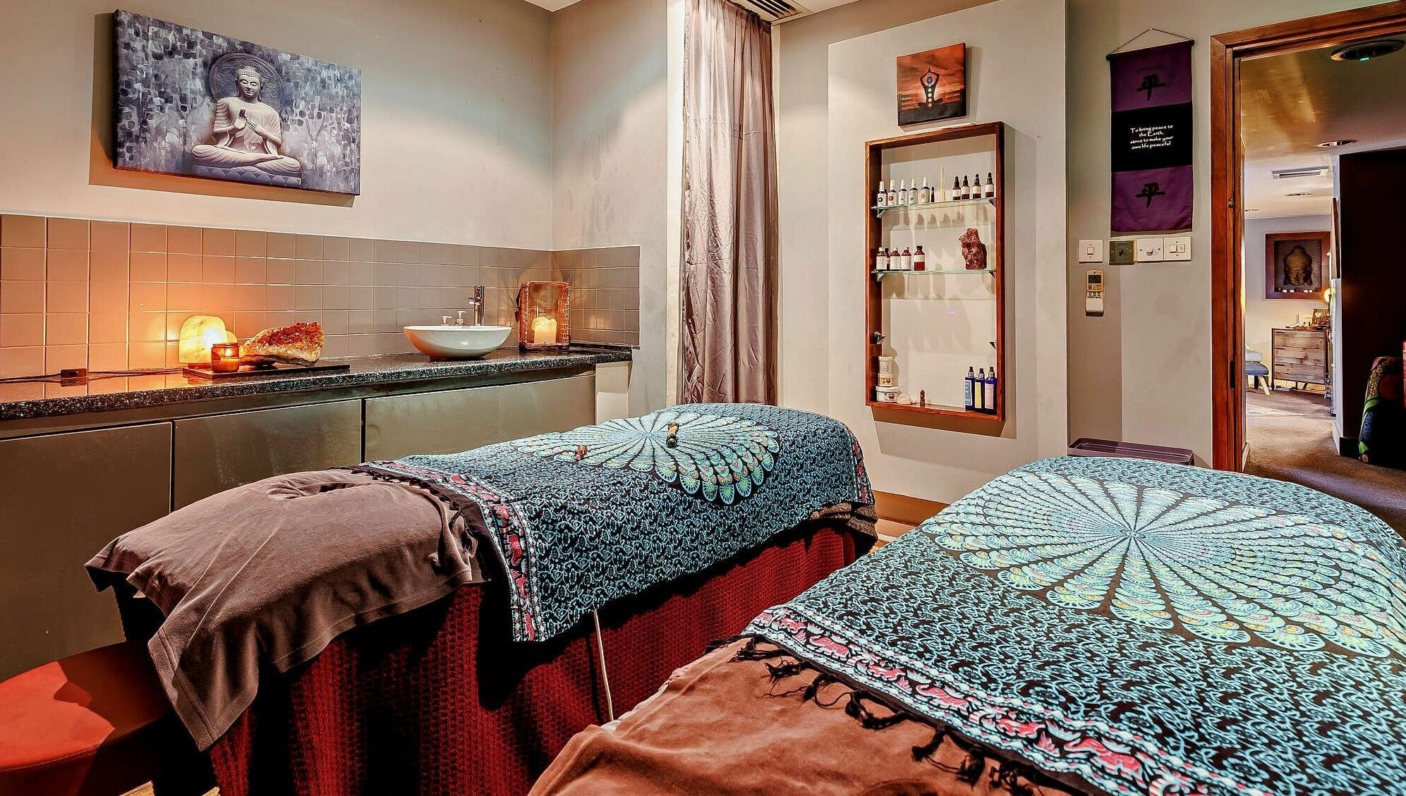 Serene massage room at Natural Light Spa and Wellness, Guildford, England, GB, featuring calming decor.