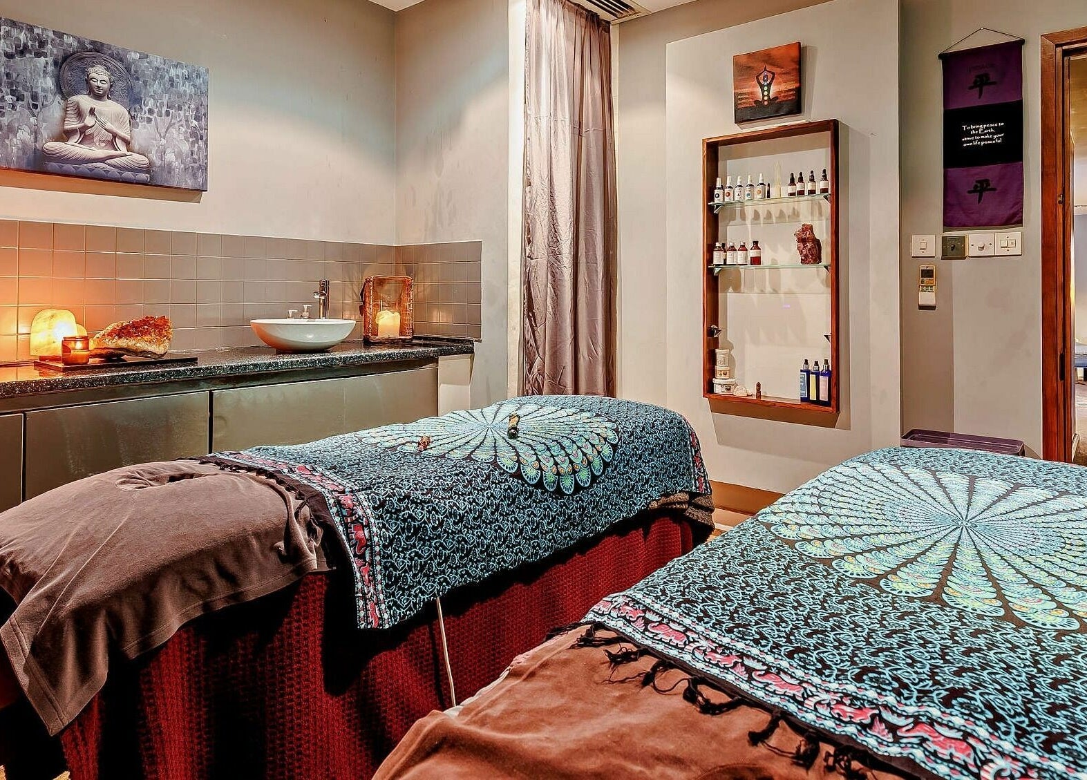 Serene massage room at Natural Light Spa and Wellness, Guildford, England, GB, featuring calming decor.
