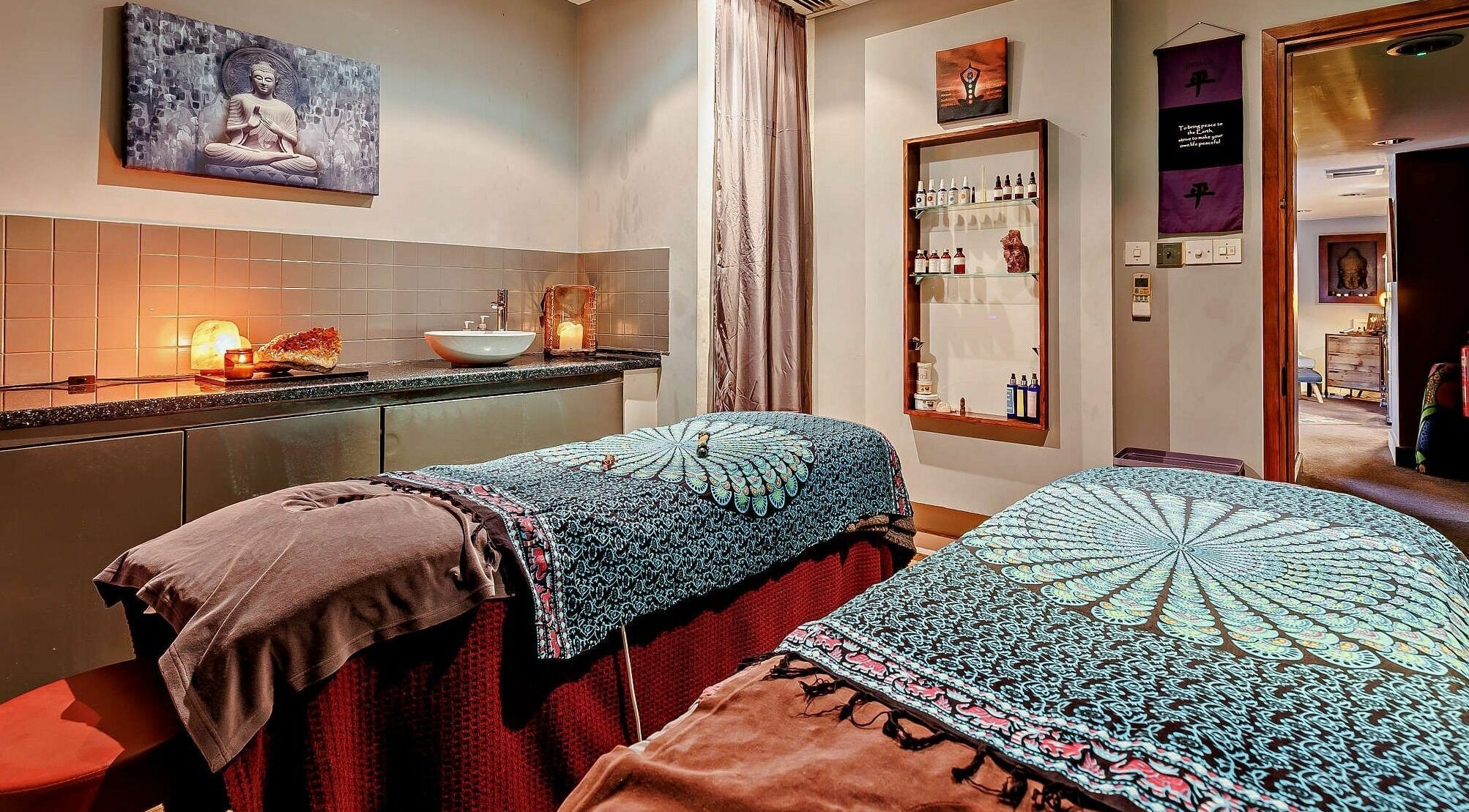 Serene massage room at Natural Light Spa and Wellness, Guildford, England, GB, featuring calming decor.