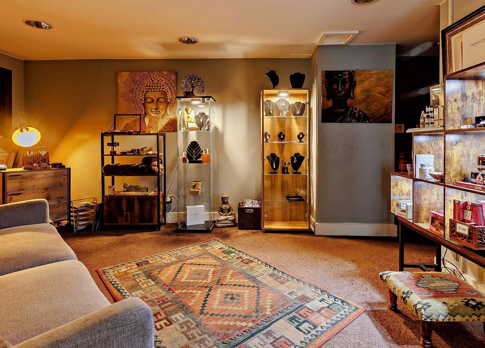 Comfortable lounge at Natural Light Spa and Wellness in Guildford, England, GB, featuring warm lighting and decor.