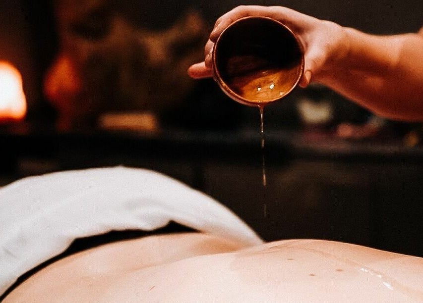 Luxury oil massage at Natural Light Spa and Wellness, Guildford, England, GB. Experience ultimate relaxation.