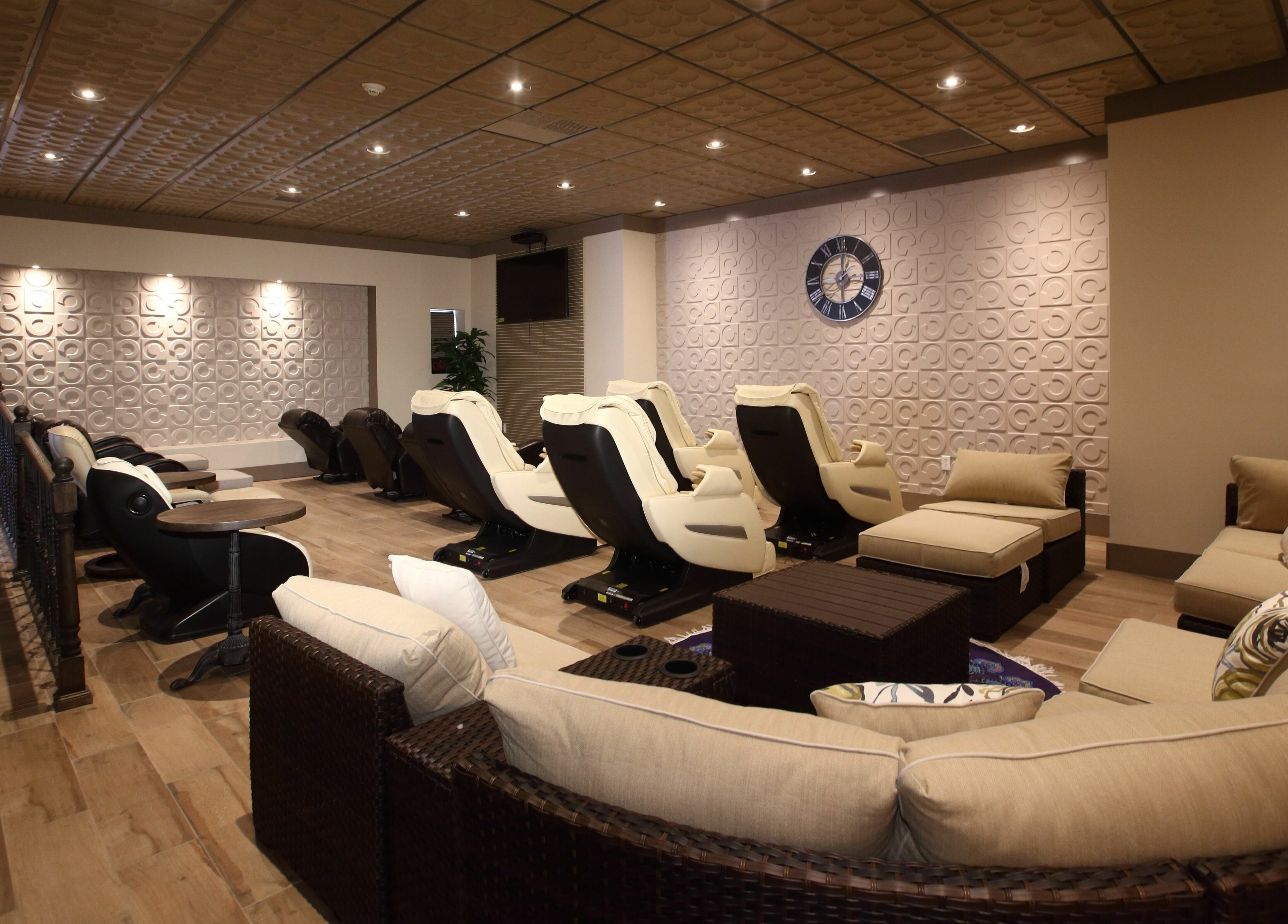 Comfortable spa seating in Aria Spa, Butler, New Jersey, US, with plush chairs and cozy decor.