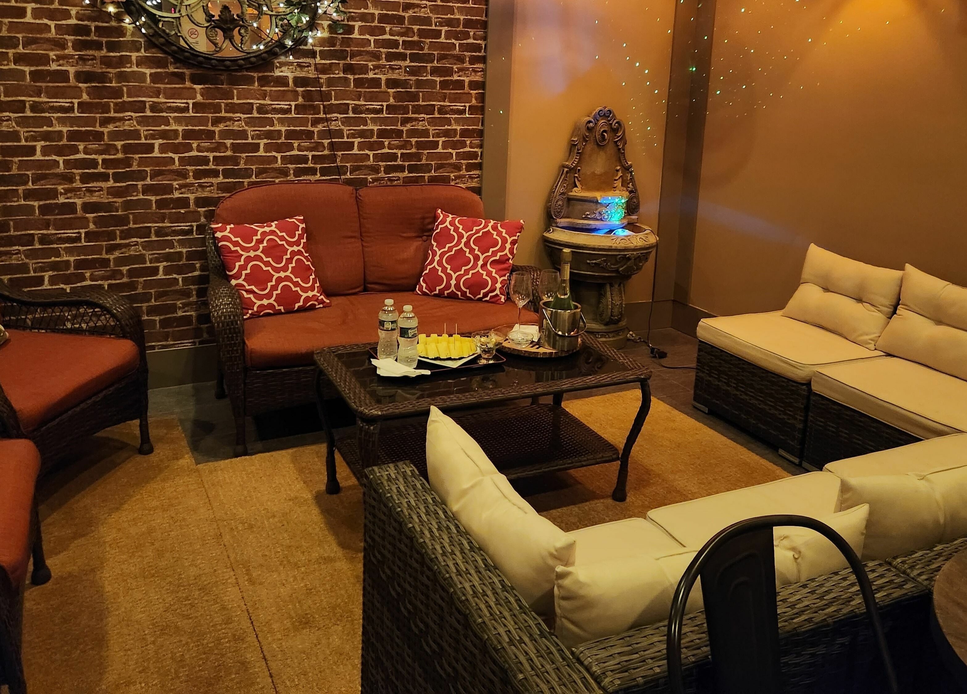 Relaxing lounge setup at Aria Spa, Butler, New Jersey, US with comfortable seating and elegant decor.