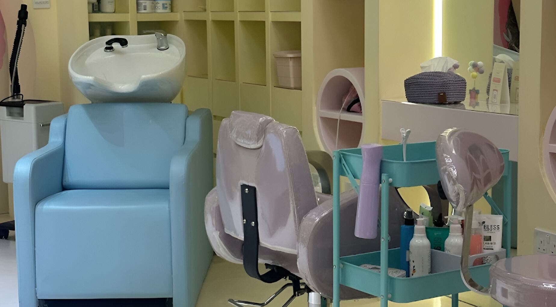 Interior of ManeandNatural | كيرلي بوتيك - Riyadh Branch featuring stylish salon chairs in Riyadh, SA.