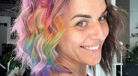 Vibrant rainbow hairstyle at Hair by Florie, Surry Hills, New South Wales, AU.