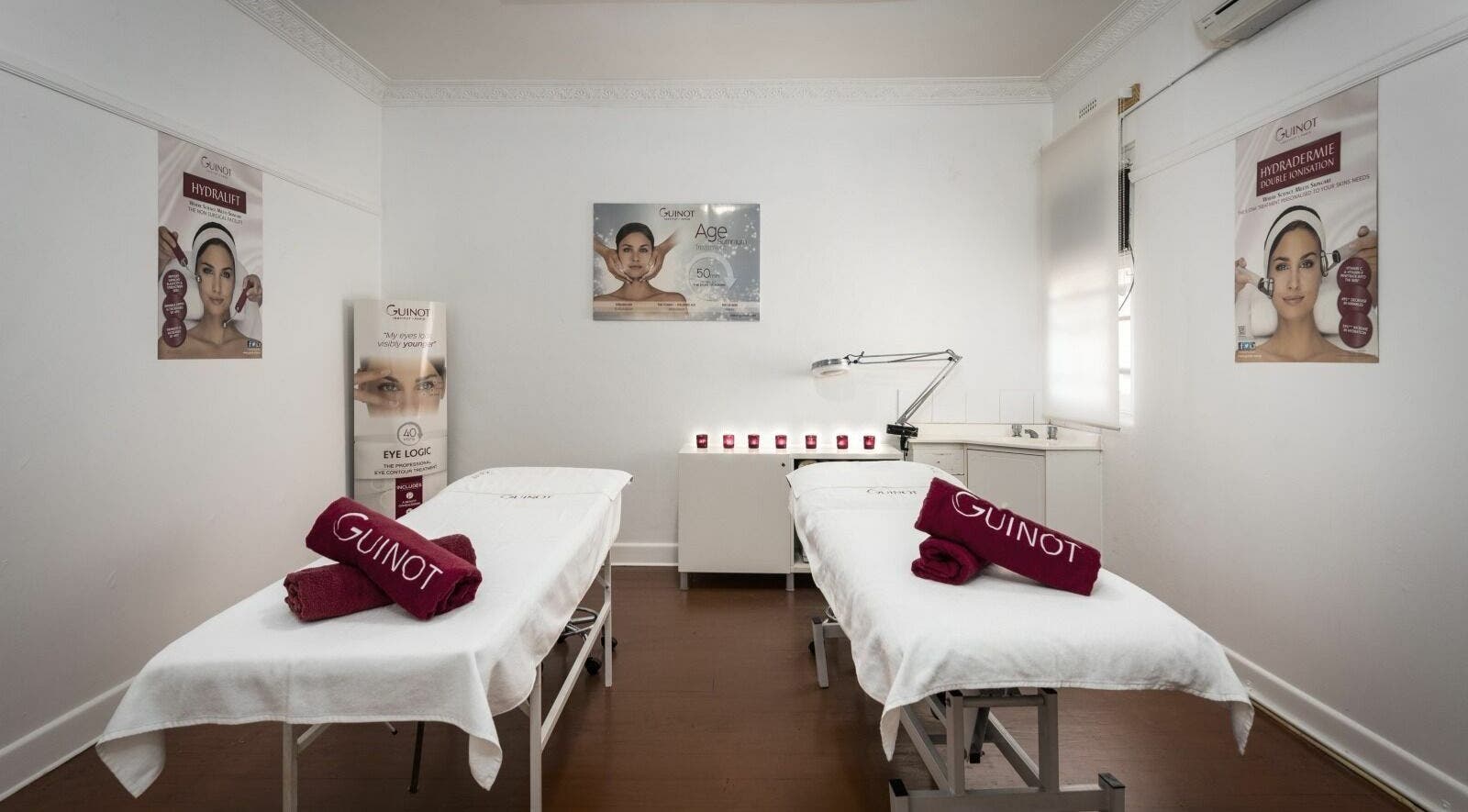 Tranquil treatment room at Beauty Nirvana, Melbourne, Victoria, AU, featuring two treatment beds and ambient lighting.