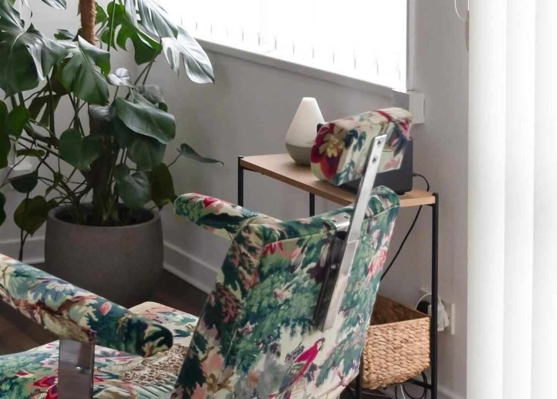 Elegant floral chair at Atelier Yurga, Chipping Norton, England, GB, highlighting a relaxing atmosphere.