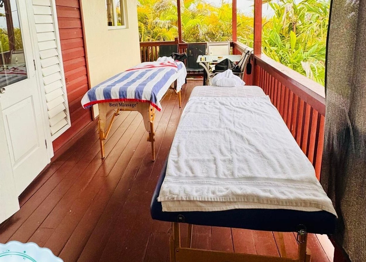 Outdoor massage tables at Serenity and Bliss Mobile Massage Barbados, Saint Michael, BB, offering a peaceful setting.