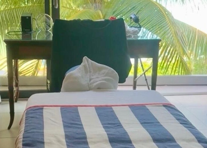 Massage setup at Serenity and Bliss Mobile Massage Barbados, Saint Michael, with tropical view.