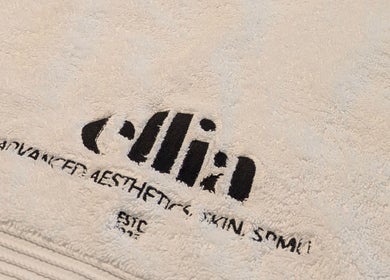 Close-up of an Ellia branded towel at Ellia | Advanced Aesthetics, Skin, SPMU in Orpington, England, GB.