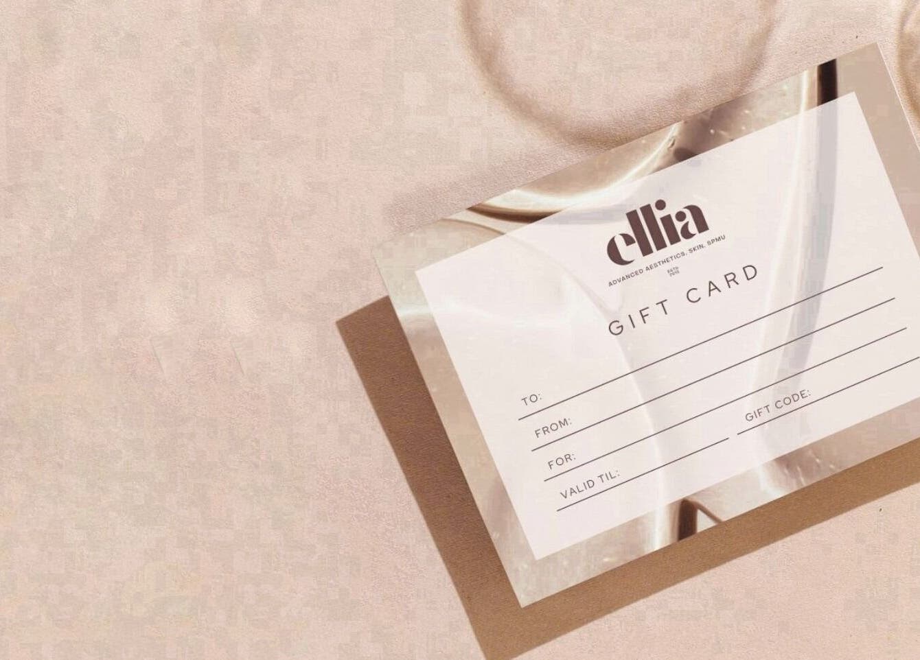 Ellia | Advanced Aesthetics, Skin, SPMU gift card on a beige surface, Orpington, England, GB.