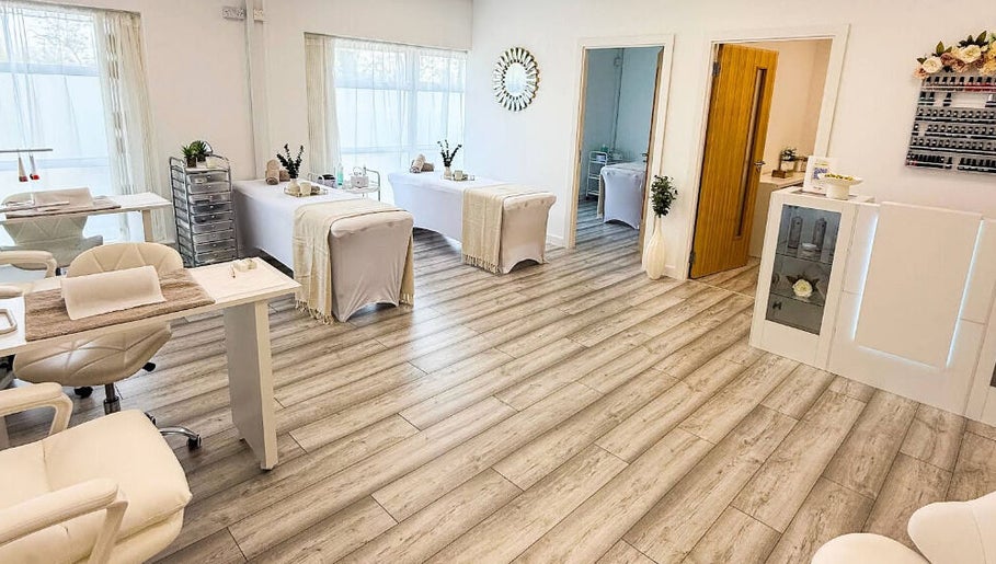 Spacious, serene treatment room at Natalie's Beauty & Training, Cardiff, Wales, GB, with elegant decor.