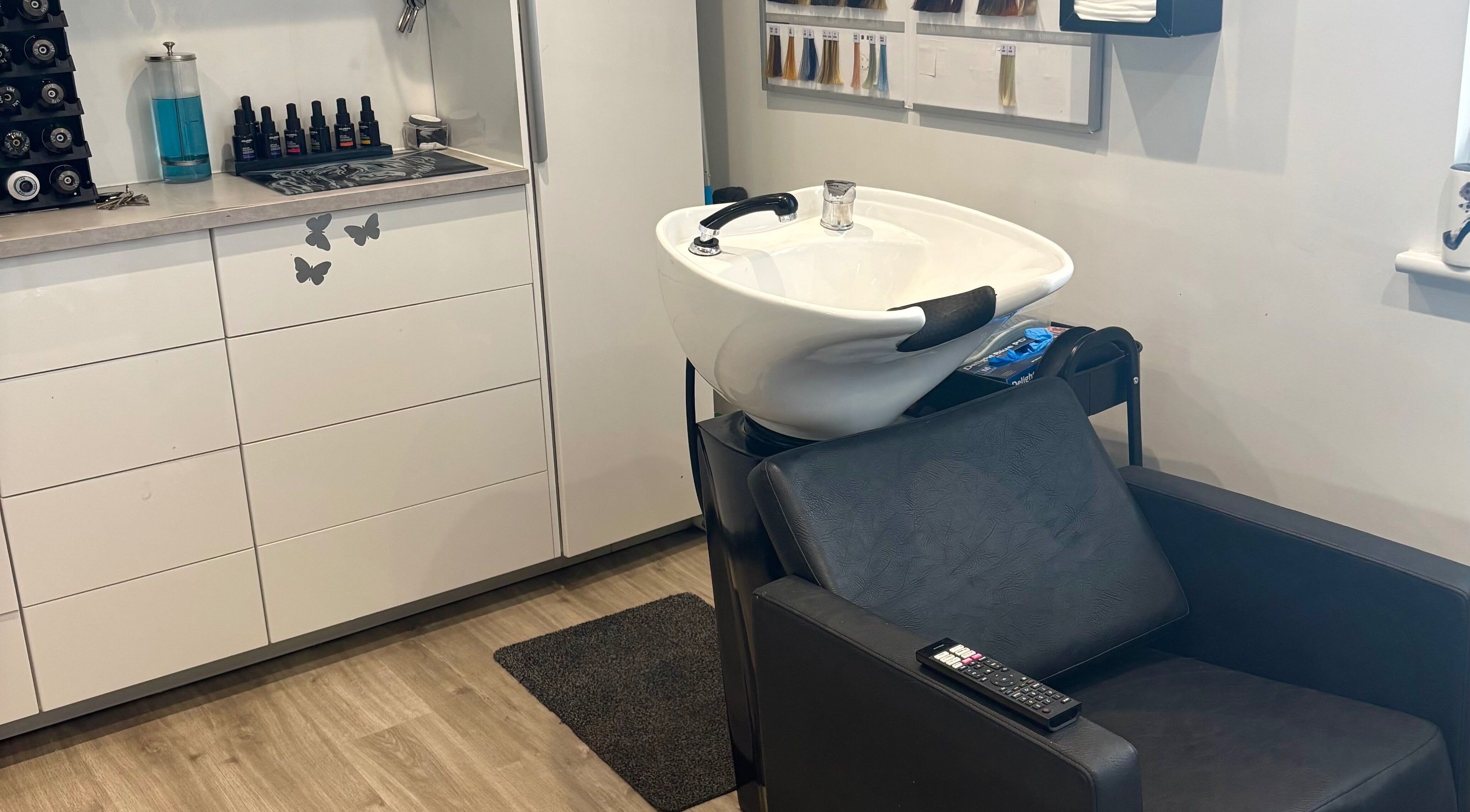 Modern wash station at Tresses Colour & Styling Room, Rochford, England, GB, ready for beauty treatments.