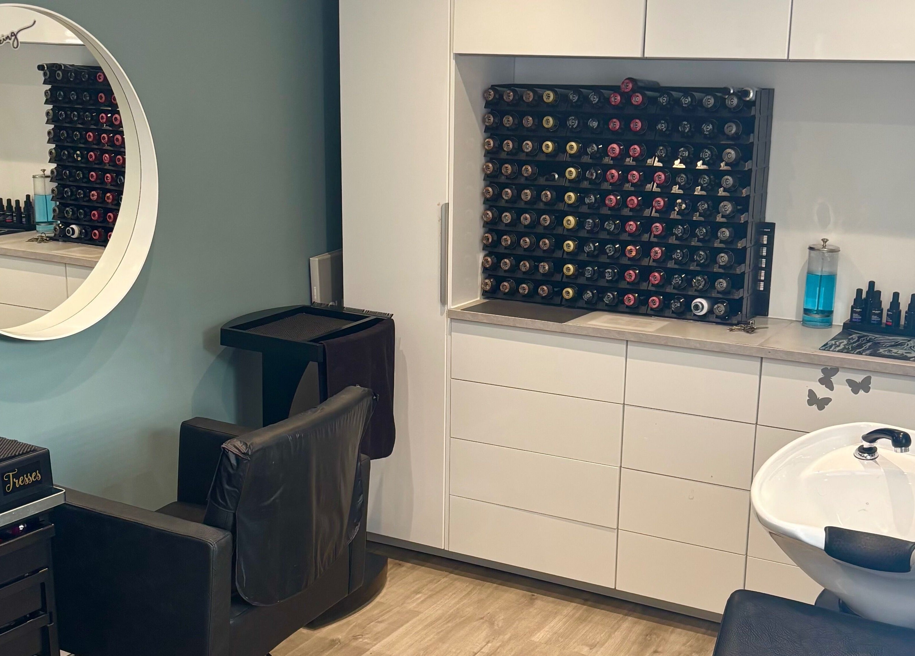 Tresses Colour & Styling Room in Rochford, England, GB, featuring sleek styling chairs and hair products.