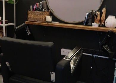 A stylish chair and mirror setup at Queer Shears at Jimi’s Barbershop, Brighton, England, GB.