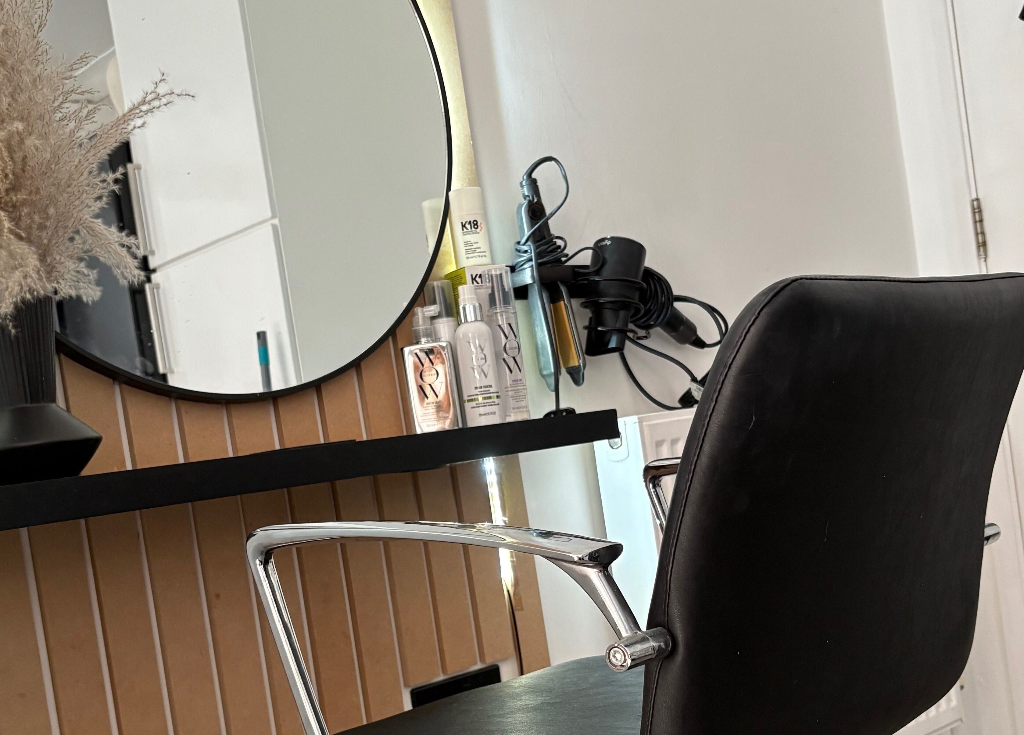 Stylish RD Hair salon station in Ixworth, England, GB, featuring products and modern decor.