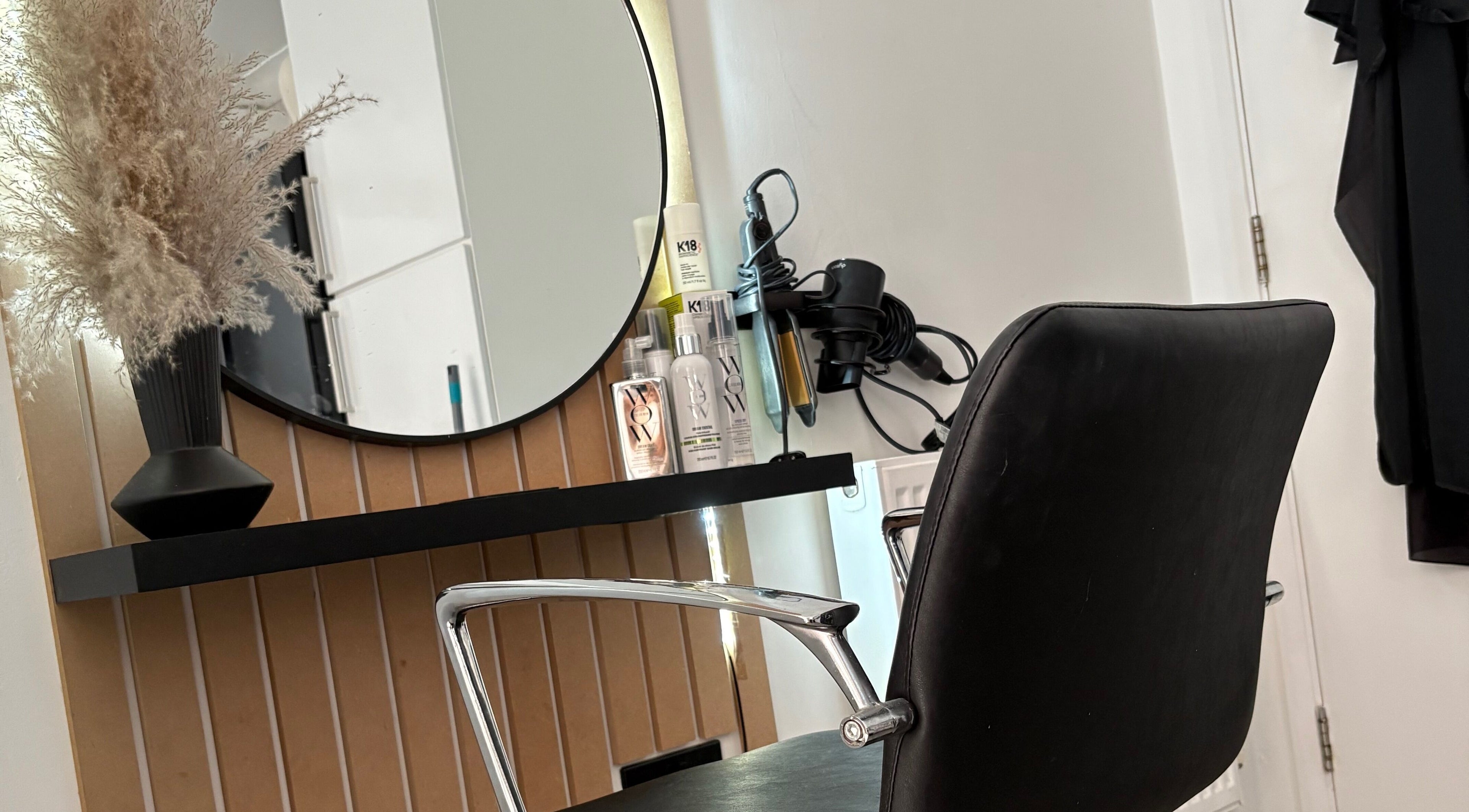 Stylish RD Hair salon station in Ixworth, England, GB, featuring products and modern decor.