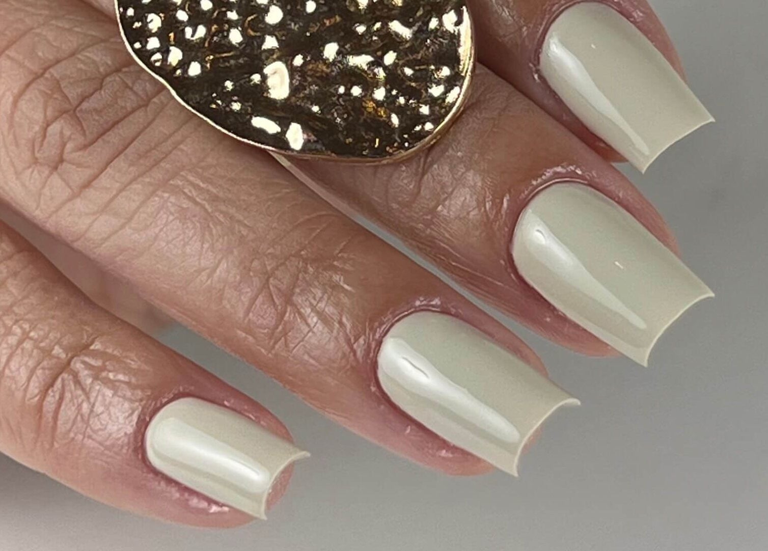 Elegant nail design with soft cream polish at Bless Nails Lisbon, Lisboa, Lisboa, PT.