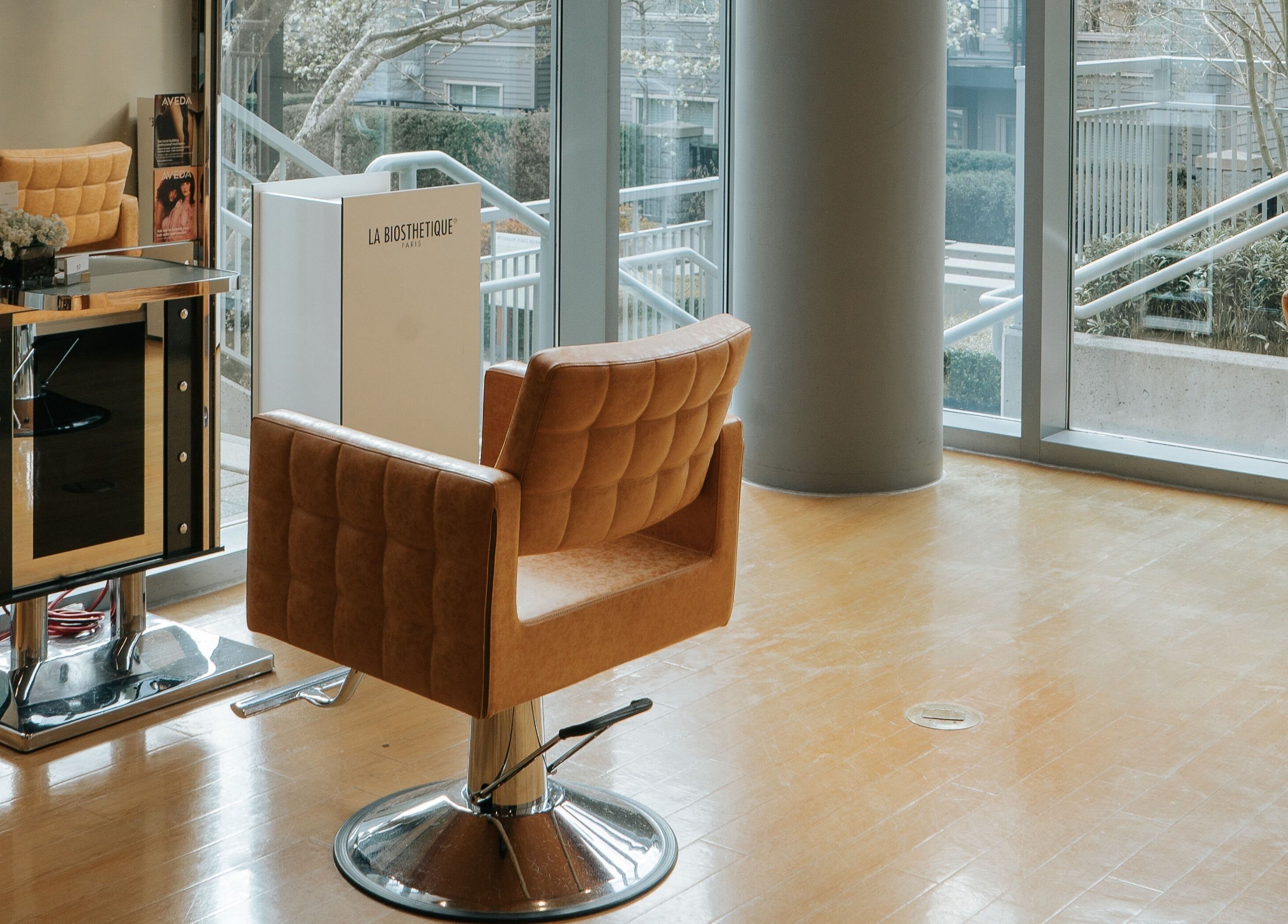 Stylish seating at E2 Salon Ubc in Vancouver, British Columbia, CA offers a relaxing ambiance.