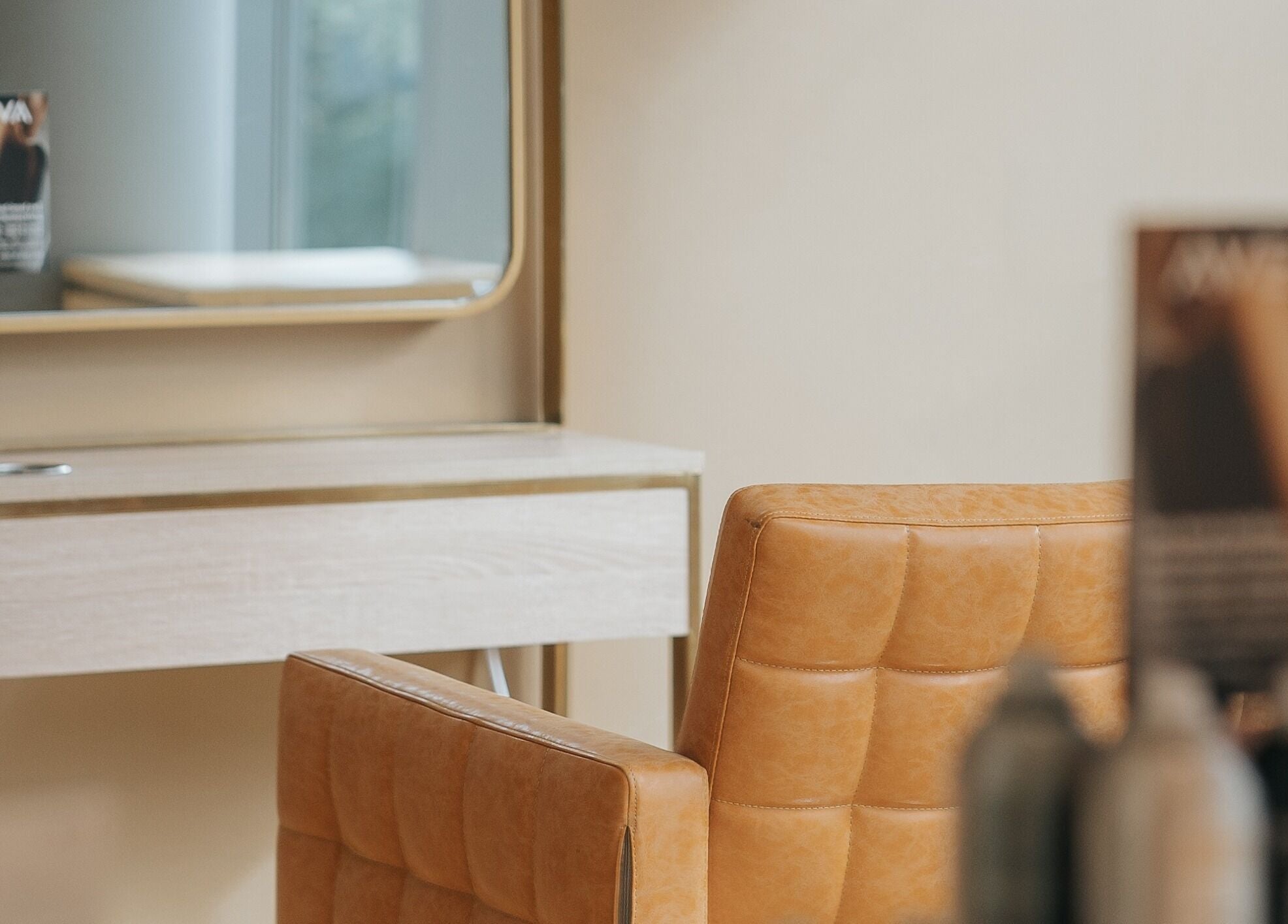Stylish salon chair and mirror at E2 Salon Ubc, Vancouver, British Columbia, CA, creating a cozy ambiance.