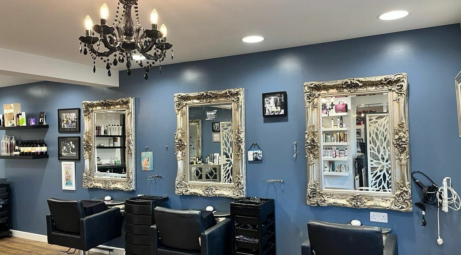 Elegant salon interiors with ornate mirrors at Scissor Sisters Hair and Beauty, Houghton le Spring, England, GB.