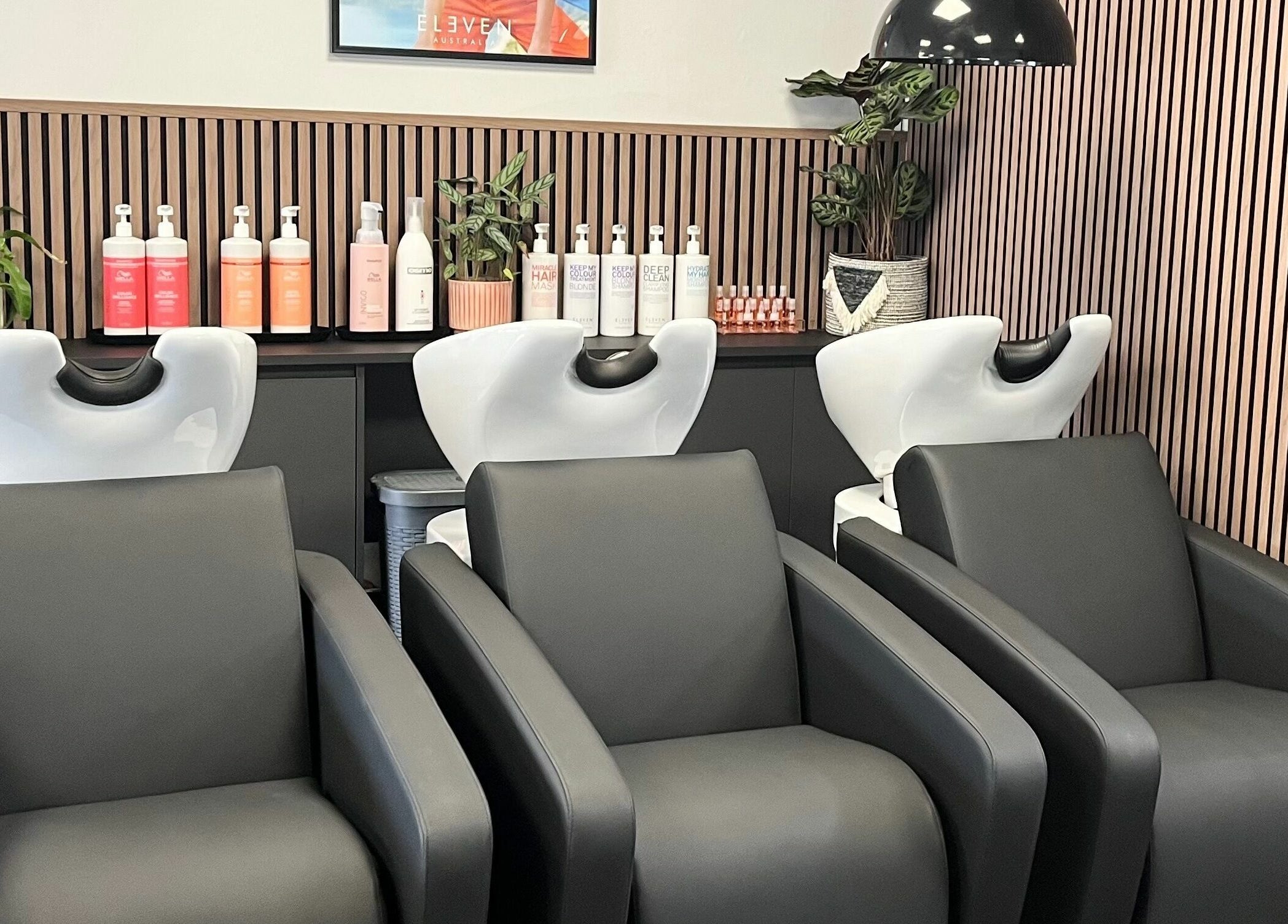 Modern wash stations at West One Hairdressing - West End, featuring sleek design in West End, England, GB.