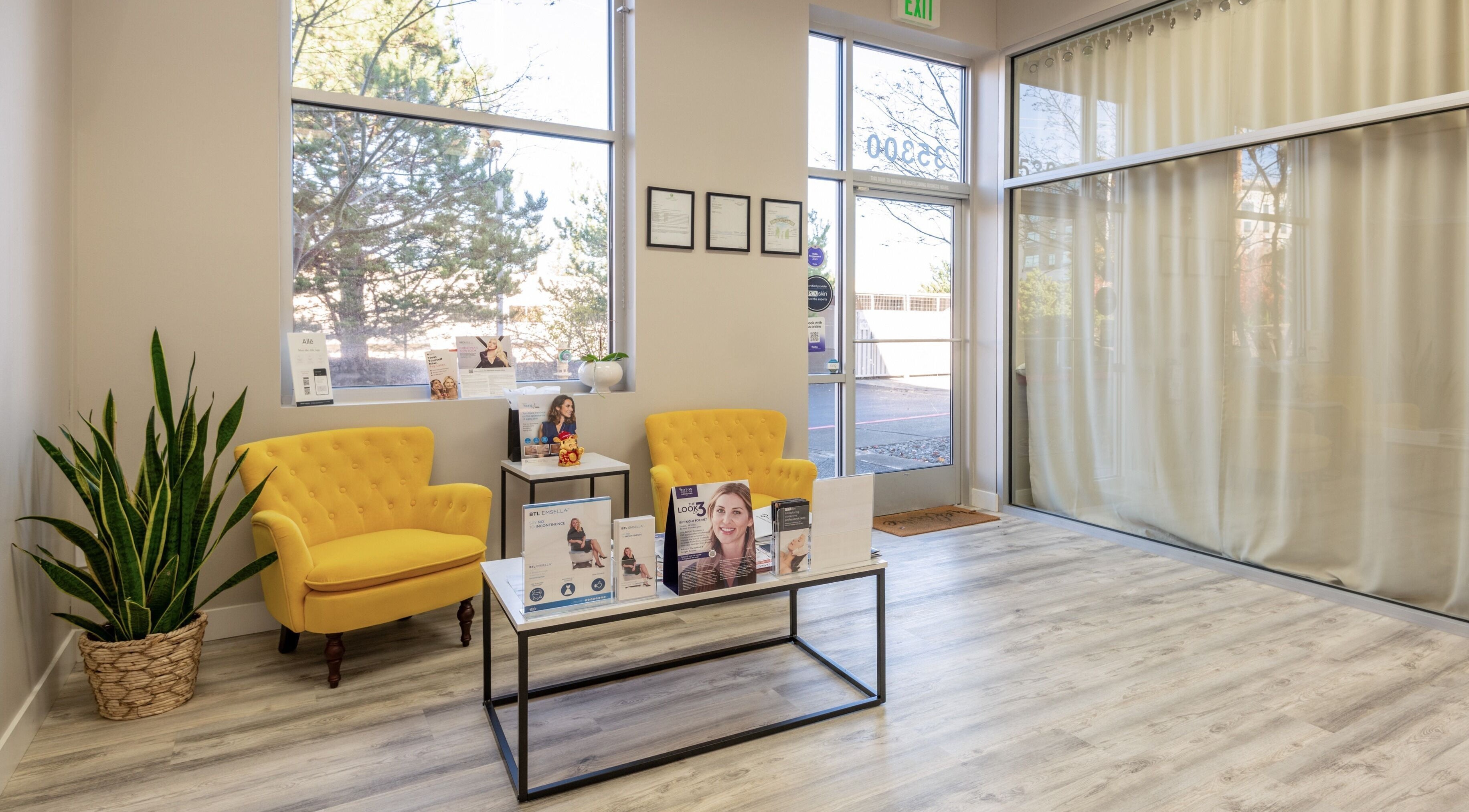 Inviting interior of Beyond Laser and Skincare - Snoqualmie, featuring plush yellow chairs in Snoqualmie, Washington, US.