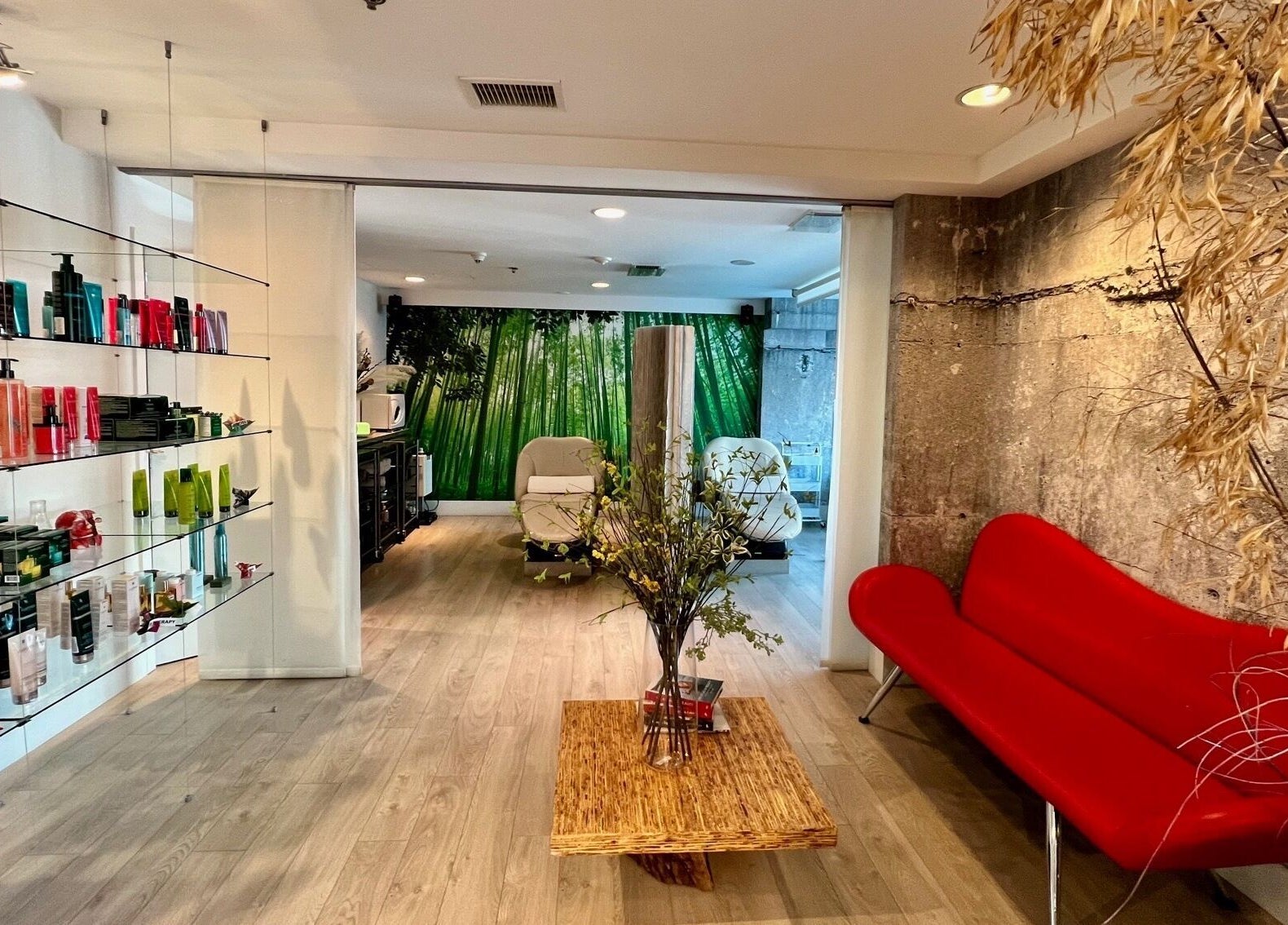 Elegant interior of House Of Yoko in North Vancouver, British Columbia, CA featuring modern decor and red sofa.