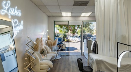 Modern interior of Lashes Girl in West Covina, California, US featuring elegant seating and a stylish treatment area.