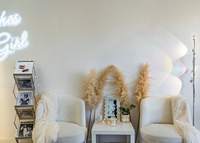 Elegant waiting area at Lashes Girl in West Covina, California with stylish decor and plush seating.