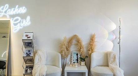Elegant waiting area at Lashes Girl in West Covina, California with stylish decor and plush seating.