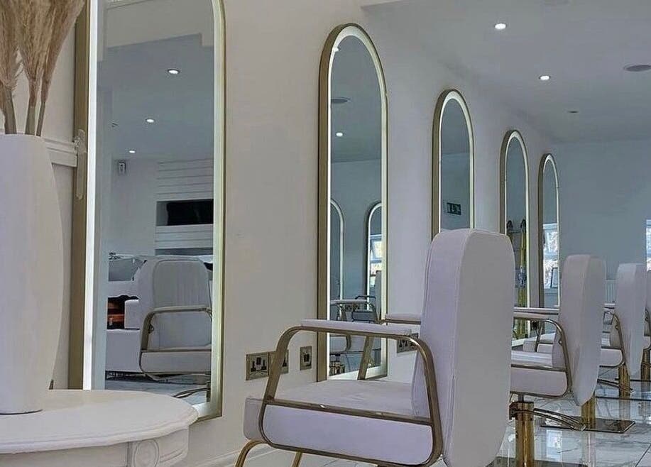 Sophisticated salon chairs and mirrors at Diane at Aura, Chester, England, GB, showcasing modern elegance.