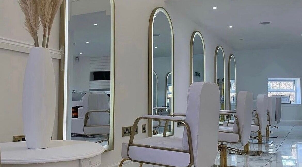 Sophisticated salon chairs and mirrors at Diane at Aura, Chester, England, GB, showcasing modern elegance.