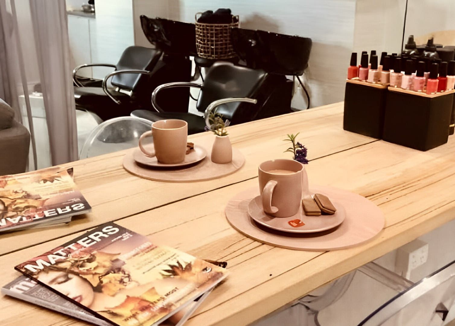 Cozy salon interior at Emily Glasson Hair Make up and Styling, Maroochydore, Queensland, AU, featuring hair styling chairs.