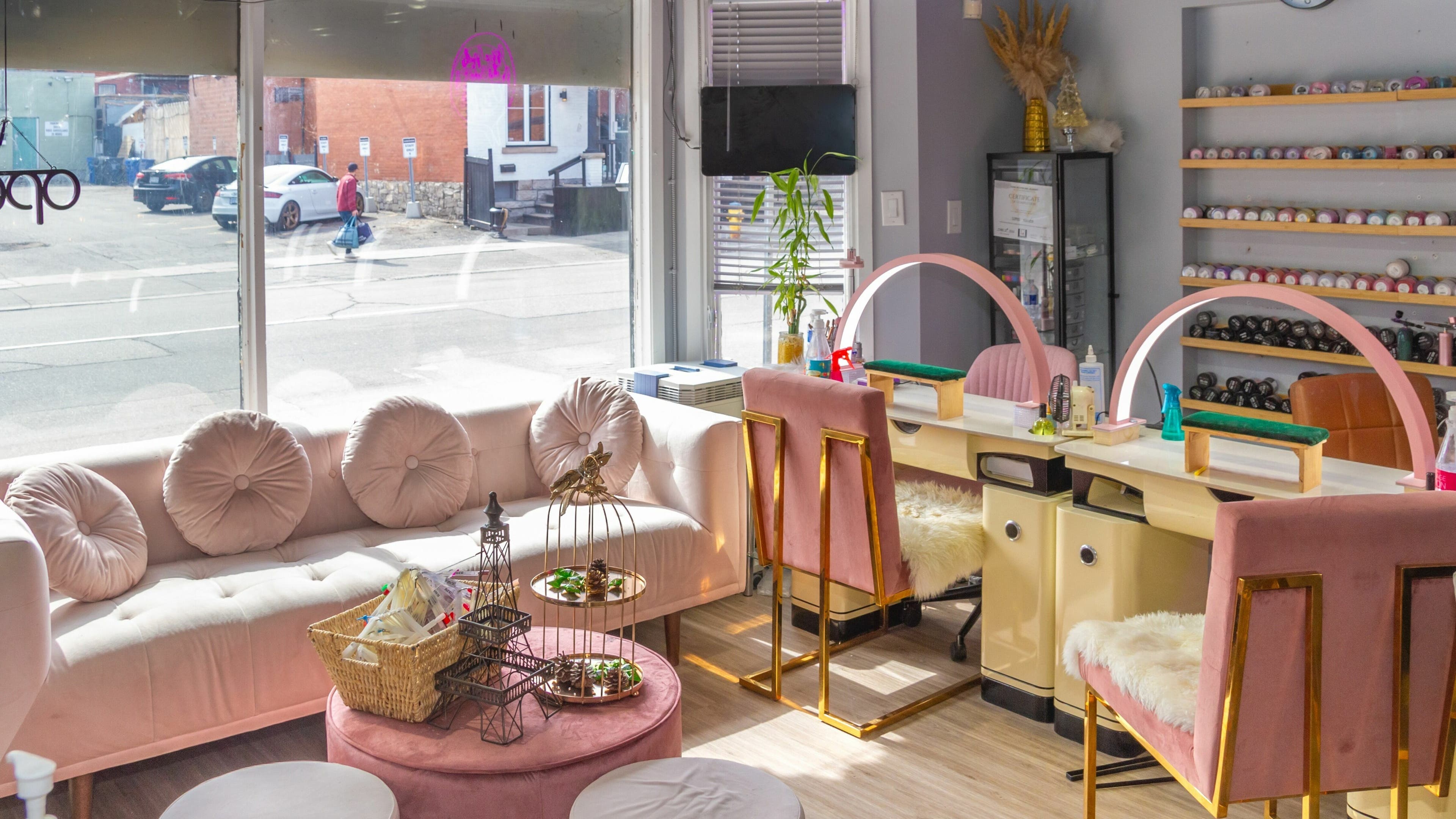 Chic interior view of La Crystal Nails and Spa, 117 Murray Street, Ottawa, Ontario, CA with soft pink decor.