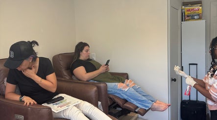 Guests relaxing at La Crystal Studio, Ottawa, Ontario, CA, as a staff member prepares for treatment.