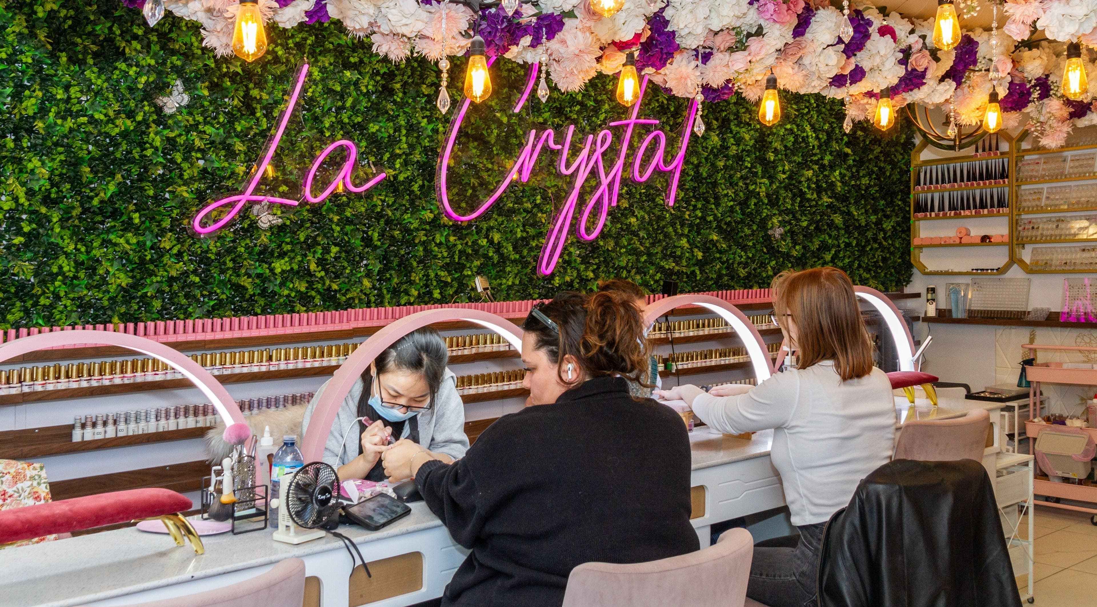 Clients receiving nail treatments at La Crystal Studio - 421 A Cumberland Street, Ottawa, Ontario, CA.