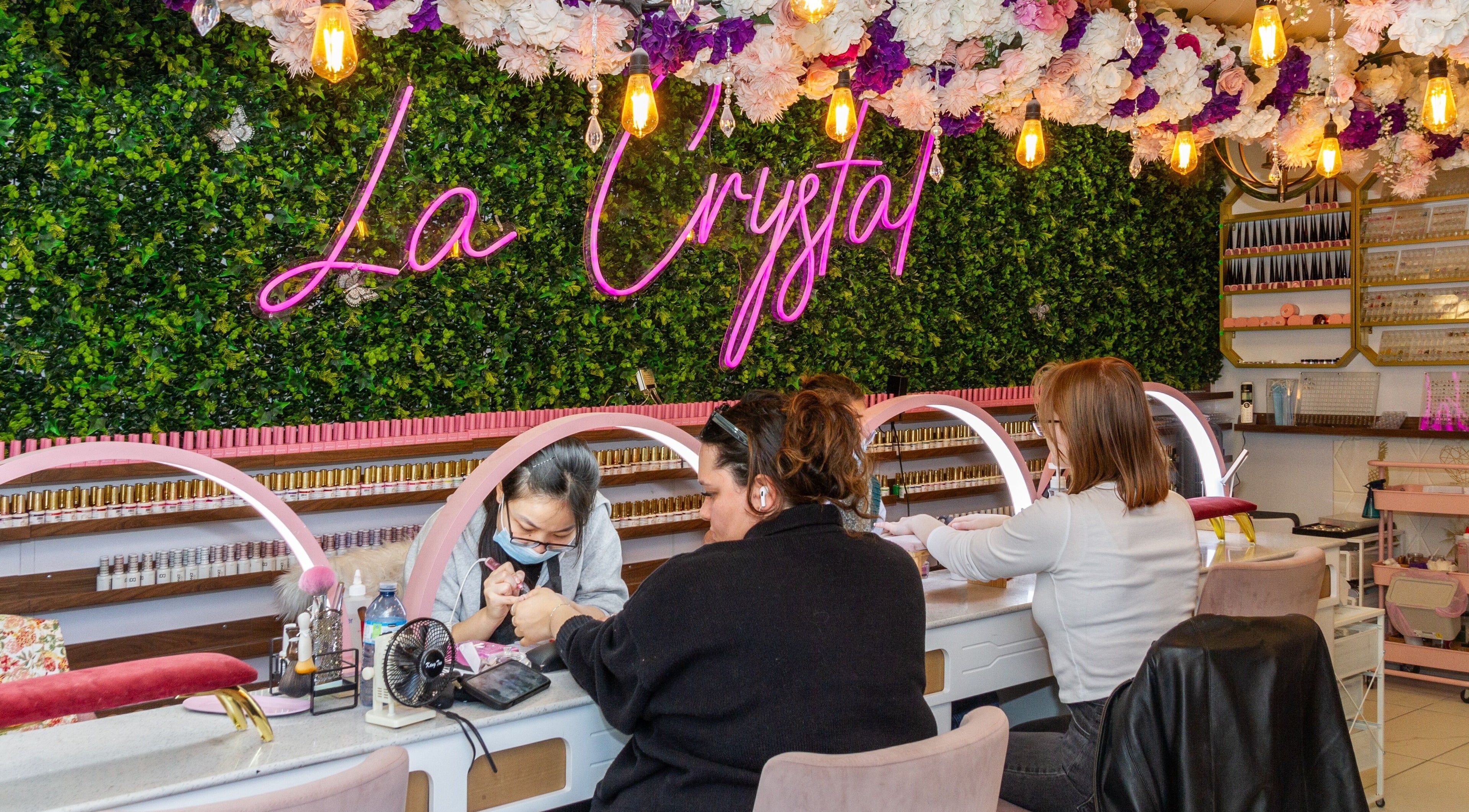 Clients receiving nail treatments at La Crystal Studio - 421 A Cumberland Street, Ottawa, Ontario, CA.
